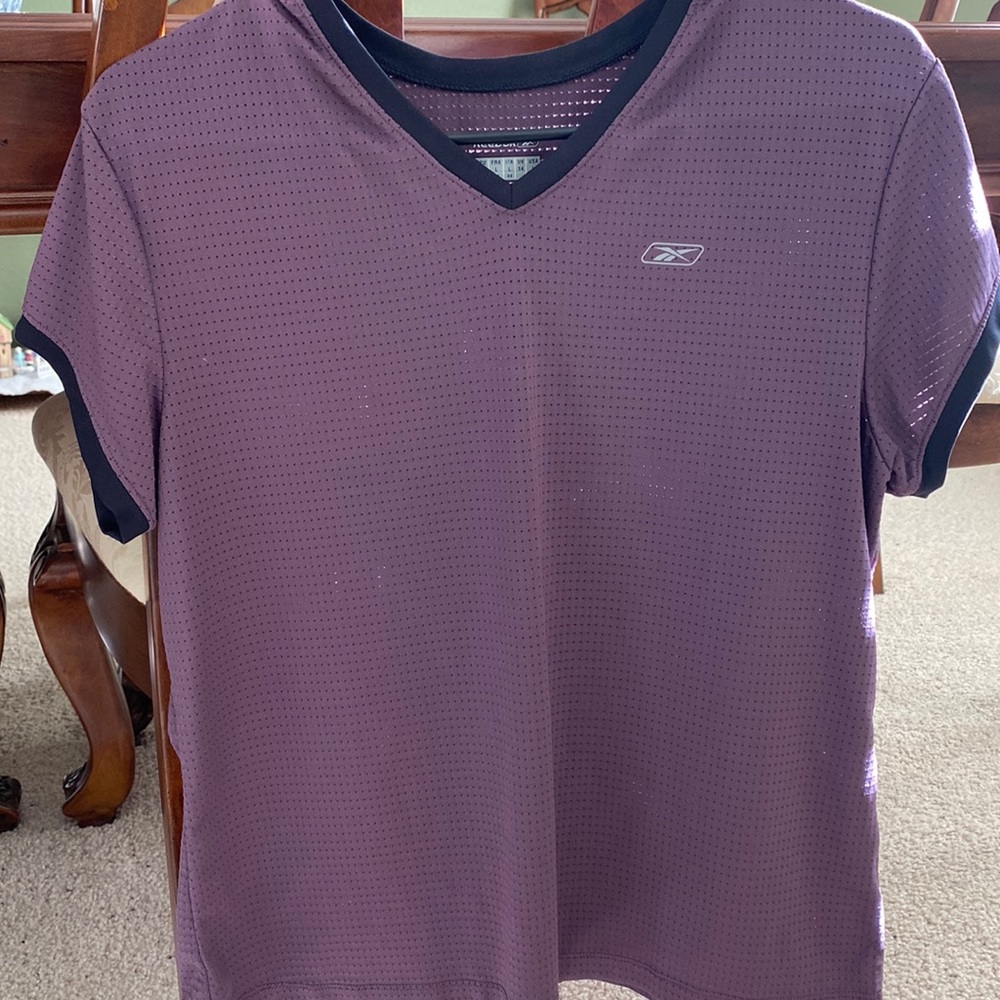 Women’s large short sleeve workout shirt.